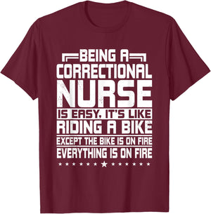 Correctional Nurse Correction Forensic Nursing Riding A Bike T-Shirt - T-Shirt | Maroon