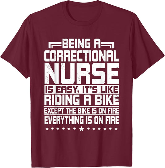 Correctional Nurse Correction Forensic Nursing Riding A Bike T-Shirt - T-Shirt | Maroon