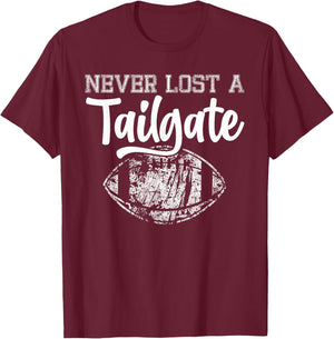 Never Lost A Tailgate Funny Football Tailgate Sports T-Shirt - T-Shirt | Maroon