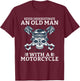 Never underestimate an old Man with a Motorcycle T-Shirt - T-Shirt | Maroon