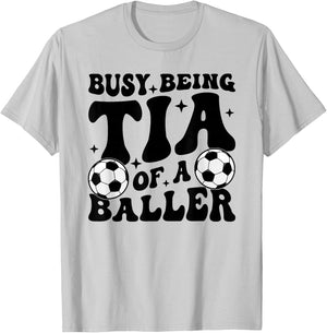 Busy Being Tia Of A Baller Soccer Tia Of A Soccer Player Tia T-Shirt - T-Shirt | Ash