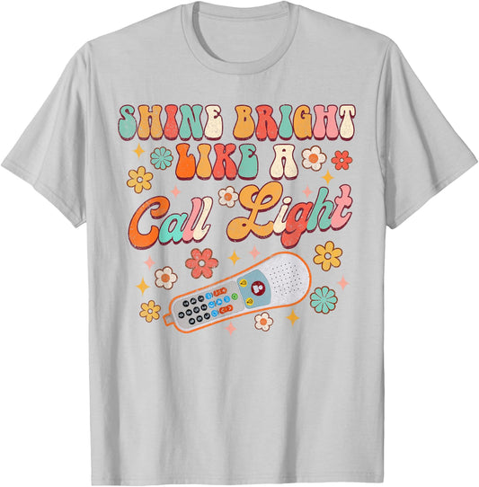Shines Bright Like A Call Light Funny ER ICU Nurse Nursing T-Shirt - T-Shirt | Ash