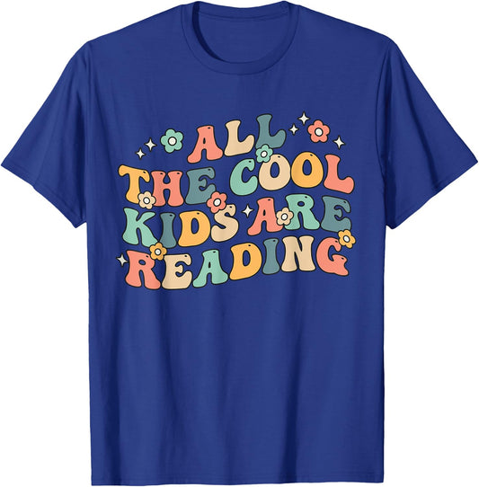 All The Cool Kids Are Reading Groovy Book Lovers World Book T-Shirt - T-Shirt | Royal