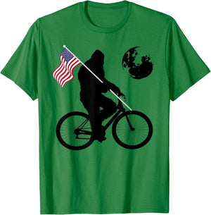 Funny Bigfoot Riding Bike For Bikers Sasquatch American flag Women Kids Men T-Shirt - T-Shirt | Irish Green