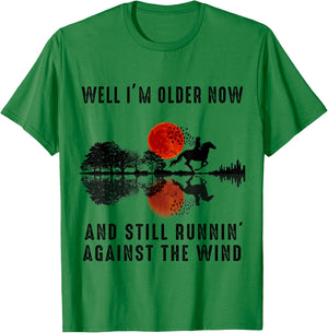 Well I’m Older Now But I’m Still Running Against The Wind T-Shirt - T-Shirt | Irish Green
