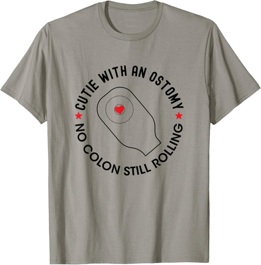 Cutie with an Ostomy no Colon Still Rolling Funny Ostomate T-Shirt - T-Shirt | Sand
