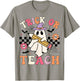 Trick Or Teach Groovy Teacher Halloween Retro Floral Ghost T-Shirt - T-Shirt | Sand